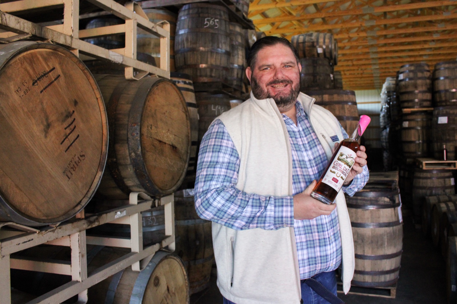 Founder in the barrel room with Girl Dad Bourbon